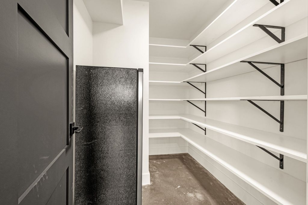 Pantry with multiple shelving units in the Modern Workshop.